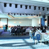 Opening remarks during Lebanon Clusters 2025. Audience listening to Mr. Maroun Chammas addressing his speech.